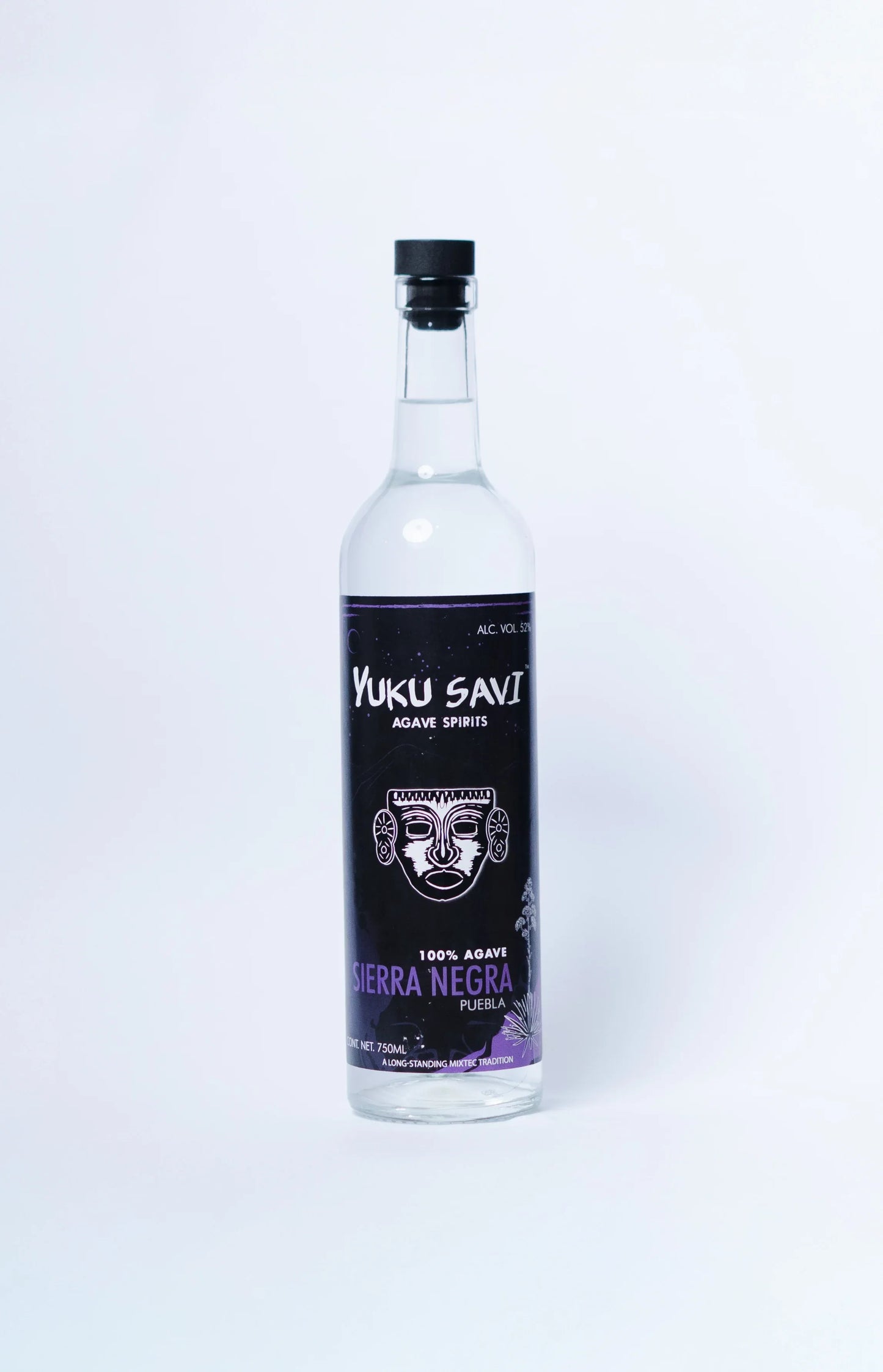 Yuku Savi Sierra Negra mezcal bottle, small-batch artisanal agave spirit from Puebla Mexico